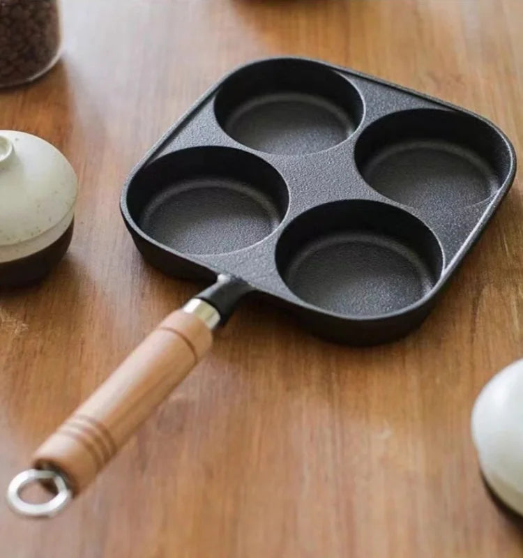JUSTINLAU 2/4-Hole Cast Iron Omelette Pot Household Non-stick Flats-bottomed Egg Dumpling Pot Breakfast Egg Burger Frying Pan